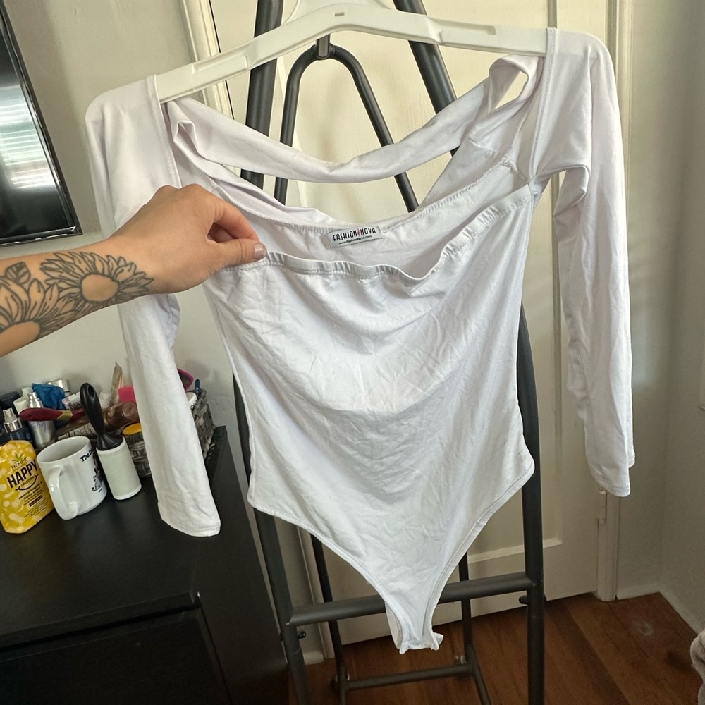 White Fashion Nova bodysuit. Brand new without tags.